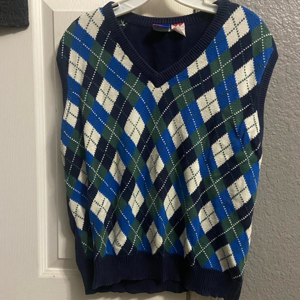 Tail sweater vest